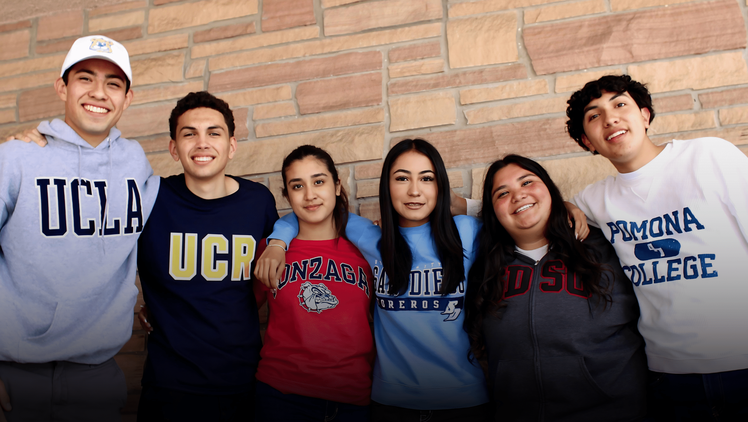 students in college sweatshirts